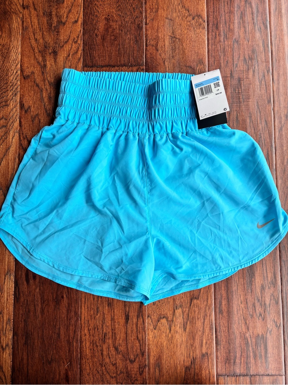 Nike Women's Bright Turquoise Smocked-Waist Athletic Shorts